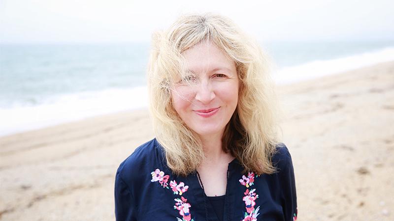 A 60 year old woman with a youthful face. Instalift concept.