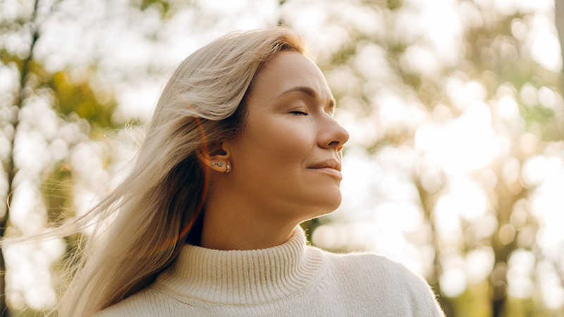 An older woman with smooth, beautiful skin. Liquid Facelift concept.